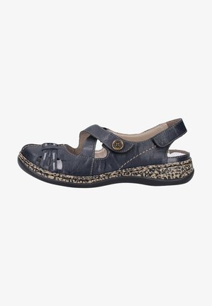 Leder-Sandale in Marineblau mit runder Spitze, offenem Fersenbereich und verstellbarem Riemen, ausgestattet mit einer gemusterten Sohle und dekorativen Akzenten.
