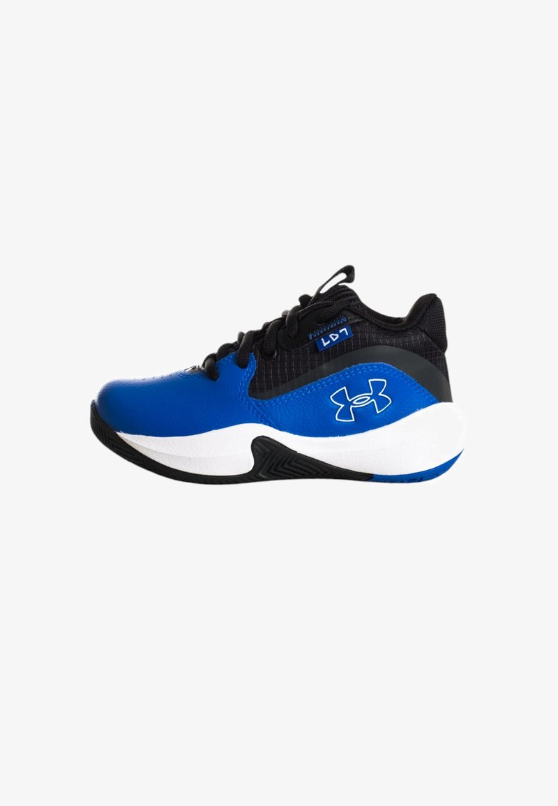 Zapatilla deportiva azul y negra con parte superior texturizada, media suela blanca y suela exterior de goma negra que presenta un patrón de textura distintivo.