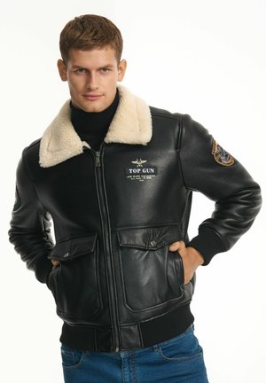 - Kurtka ze skóry ekologicznej