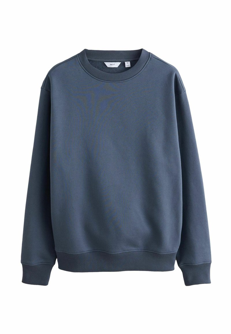 Donkerblauwe sweatshirt van zachte stof. Heeft een ronde halslijn en ribgebreide manchetten. Eenvoudig, ongecompliceerd ontwerp. Geen zichtbare logo's.