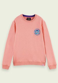 Koralrosa sweatshirt i mjuk bomull. Har rund halsringning och ribbade ärmslut. Vänstra bröstet har en cirkulär grafik med palmträd.