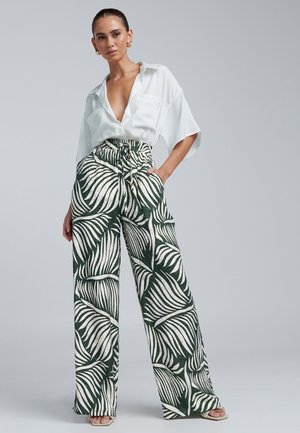 ALAIA - Hlače - khaki floral