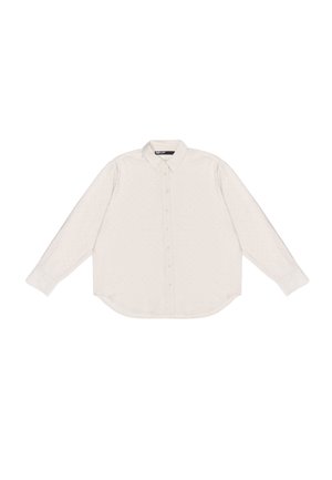 Svetlo béžová košeľa s dlhým rukávom a golierom, so subtílnymi bodkovanými vzormi, zaobleným lemom a zapínaním na gombíky. Hladký textil príjemný na dotyk.