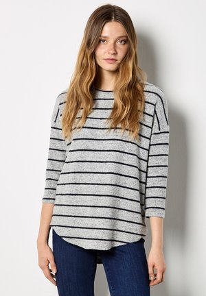 - Bluzka z długim rękawem