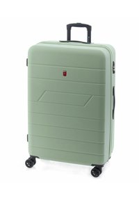 Harde koffer in muntgroen, met een gestructureerd oppervlak met horizontale groeven, zwarte wielen en een uitschuifbare handgreep.