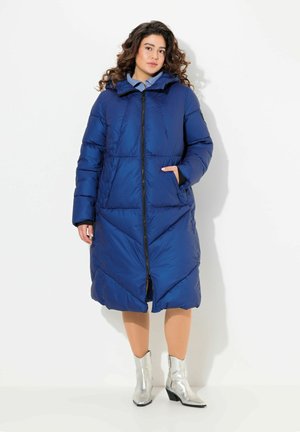 Blue puffer coat with a hood, features a front zipper, side pockets, and chevron stitching details. Made from shiny, weather-resistant material.