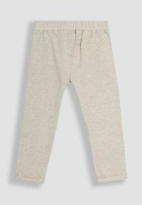 Light grey leggings made of soft, stretchy fabric, featuring an elastic waistband and tapered legs with simple stitching detail.