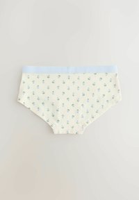 Slip di cotone giallo pallido con un elastico azzurro chiaro, caratterizzato da un motivo floreale di piccoli fiori blu e foglie verdi in tutto il tessuto.