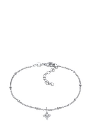 Bracelet en chaîne en argent avec un charme en forme d'étoile orné d'un petit accent en diamant, design de maillons complexe et fermoir à homard.
