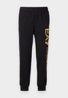TROUSER - Pantalones deportivos - black/gold