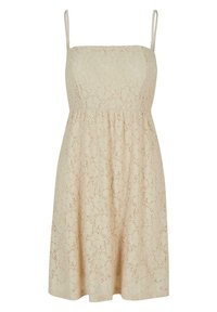 Robe beige sans manches avec fines bretelles et motif en dentelle florale, ajustée à la taille et légèrement évasée vers l'ourlet.