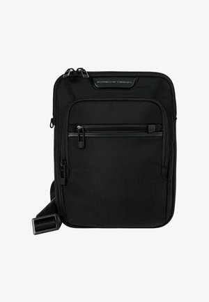 Sac messager noir en tissu texturé, doté d'une poche avant zippée et d'une sangle réglable. Design minimaliste avec la marque Porsche Design.