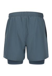 Blauwe sportshorts van lichtgewicht stof, met een elastische tailleband en een binnenvoering. Voorzien van zwarte zijzakken en een gladde textuur.