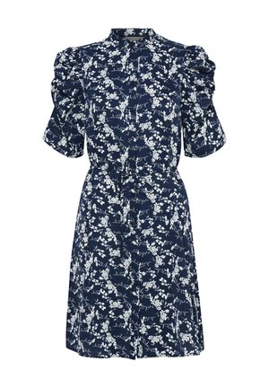 Marinblå blommig klänning med puffärmar, knapprad fram och knytmidja. Har vita blommönster mot en mörk bakgrund.