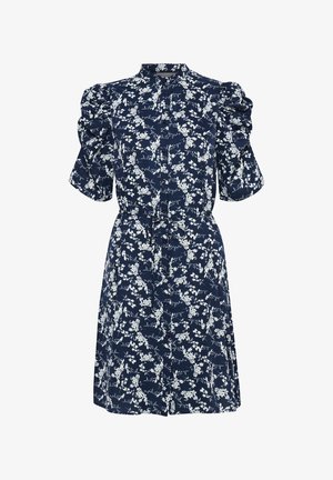 Marinblå blommig klänning med puffärmar, knapprad fram och knytmidja. Har vita blommönster mot en mörk bakgrund.