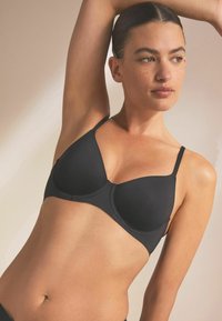 Next SMOOTHING NON PAD FULL CUP - Krūšturis ar stīpiņu - black
