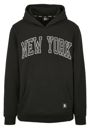 Fekete kapucnis pulóver, pamutból készült, elöl kenguruzsebbe. A mellkasán vastag fehér betűkkel van feliratozva: "NEW YORK".