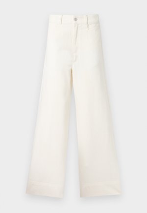 Wide-leg trousers in light beige cotton. Features a high waist, front pockets, and a straight cut. Clean hem finishing without patterns.