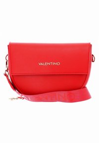 Red leather crossbody bag with a folded flap, gold hardware, and a wide logo-printed strap. Smooth texture with a structured design.