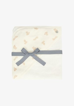 Coperta in cotone per neonati di colore crema, con motivo orso e nastrino a righe blu navy. Texture morbida con design a cappuccio per tenere caldo.