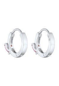 Boucles d'oreilles en argent sterling avec une finition brillante, comportant un petit accent en pierre précieuse rose sur le côté et une forme ronde lisse.