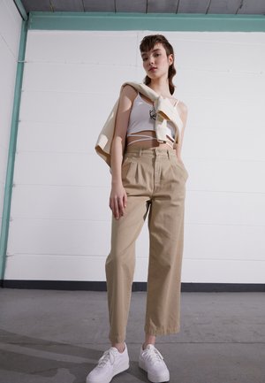 CARA PANT - Trousers - wall