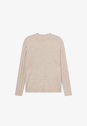 Beige neulepusero, jossa on teksturoitu geometrinen kuvio, pyöreä pääntie ja pitkät hihat. Sisältää ribbikätiset hihat ja helman.