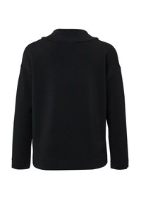 Pull noir à manches longues avec une coupe décontractée et un large col doux, présenté de dos sur fond blanc.