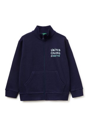 Navy blue zip-up sweatshirt with front pockets and "UNITED COLORS OF BENETTON" text on the left chest, ribbed cuffs and collar.