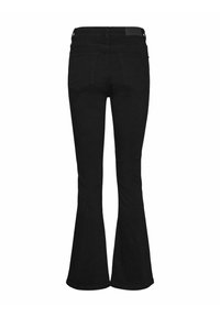 Jean noir taille haute avec jambes évasées et poches arrière, présenté sur fond blanc.