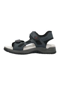 Svart sandaler med justerbara remmar, mesh detaljer och en dämpad sula. Tillverkad av syntetiska material med en tjock gummisula.