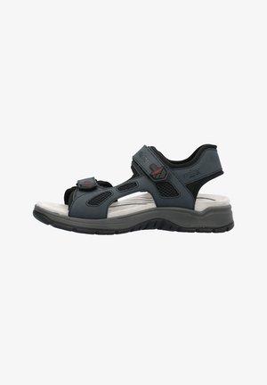 Zwarte sandalen met verstelbare banden, mesh accenten en een gevoerde voetbed. Gemaakt van synthetische materialen met een dikke rubberen zool.
