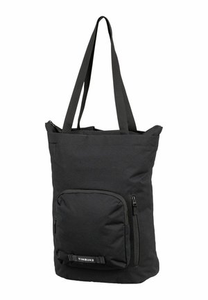 Sac fourre-tout en tissu noir avec doubles poignées, présentant une poche zippée à l'avant et un design texturé subtil. Fermeture supérieure réglable.