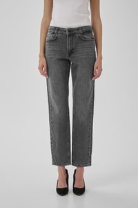 Kõrge vöökohaga, sirge jala teksased tumesinises denimis, viie taskuga, kontrastsete õmblustega ja nööpidega kinnitusega. Matte tekstuur.