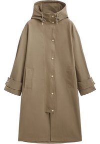 Beige, oversized raincoat with a hood, snap buttons, and two side pockets. Features rolled-up sleeves and a smooth fabric texture.