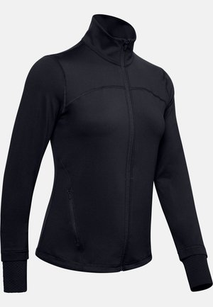 Schwarze Sportjacke aus glattem, dehnbarem Stoff. Mit hohem Kragen, durchgehendem Reißverschluss, Seitentaschen und strukturierten Bündchen.