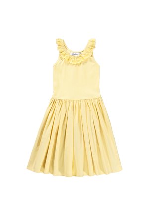 Żółta bawełniana sukienka z falbanką w dekolcie, bez rękawów i plisowanym dołem. Posiada dopasowaną górę i naturalną talię.