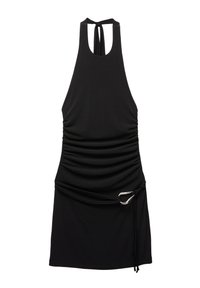 Robe noire à dos nu en tissu extensible avec texture plissée et un détail en boucle argentée à la taille. Présente une fermeture à lacet à l'arrière.