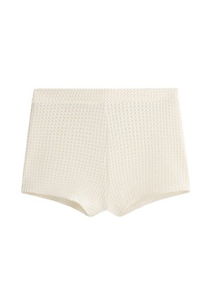 Tejszínszínű, texturált kötött rövidnadrág gofrimintával, magas derékkal és testhezálló szabással.