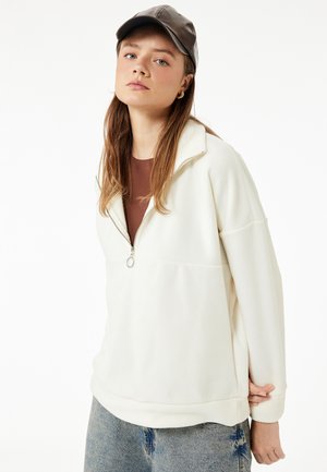 Suéter de forro polar - beige