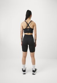 ICANIWILL SOFT SEAMLESS BIKER SHORTS - Leggingek - black