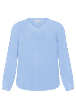 Svetlo modra bluzica z dolgimi rokavi, V-izrezom in diskretno teksturo. Ima ravno spodnje robove in rahlo nabirane manšete.