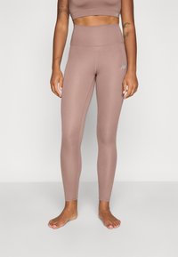 New Balance HARMONY HIGH RISE  - Leggings - earth shadow