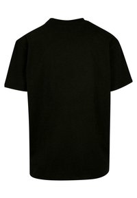 Sort T-shirt med korte ærmer, rund halsudskæring og en afslappet pasform. Lavet af blødt bomuldsstof med en glat tekstur.