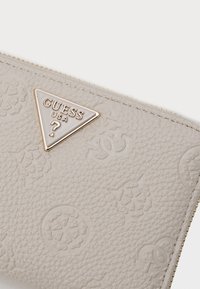 Guess CRESIDIA MEDIUM ZIP AROUND - Portefeuille - bone