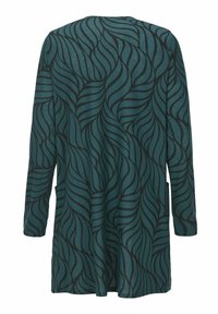 Langsleeve tuniek in diep teal, met een zwart draaiend bladerenpatroon. Zachte stof met een relaxte pasvorm en zijzakken.