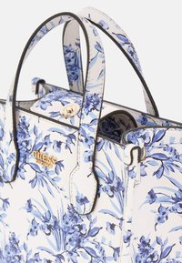 Guess Torbica - blumenmuster hell blau