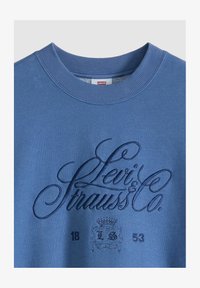 Geselecteerd, royale fancy script blues