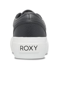 Black leather sneaker with a textured finish, featuring a white sole and a "ROXY" logo on the back. Rounded shape with padded collar.