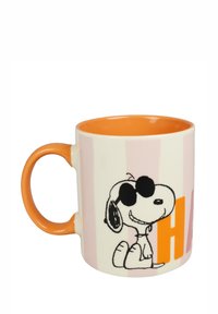 Ceramic mug with an orange handle and interior, featuring Snoopy in sunglasses and "HAP" in orange on a pink striped background.